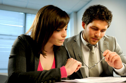 Finance Staff Looking at a Document